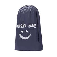 gray laundry bag with drawstring closure and large wash me with happy face on front
